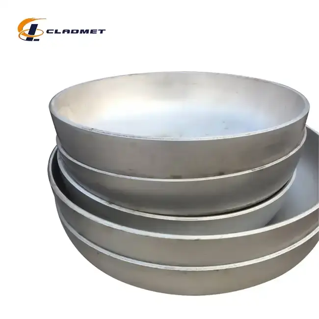 Titanium-carbon steel clad heads